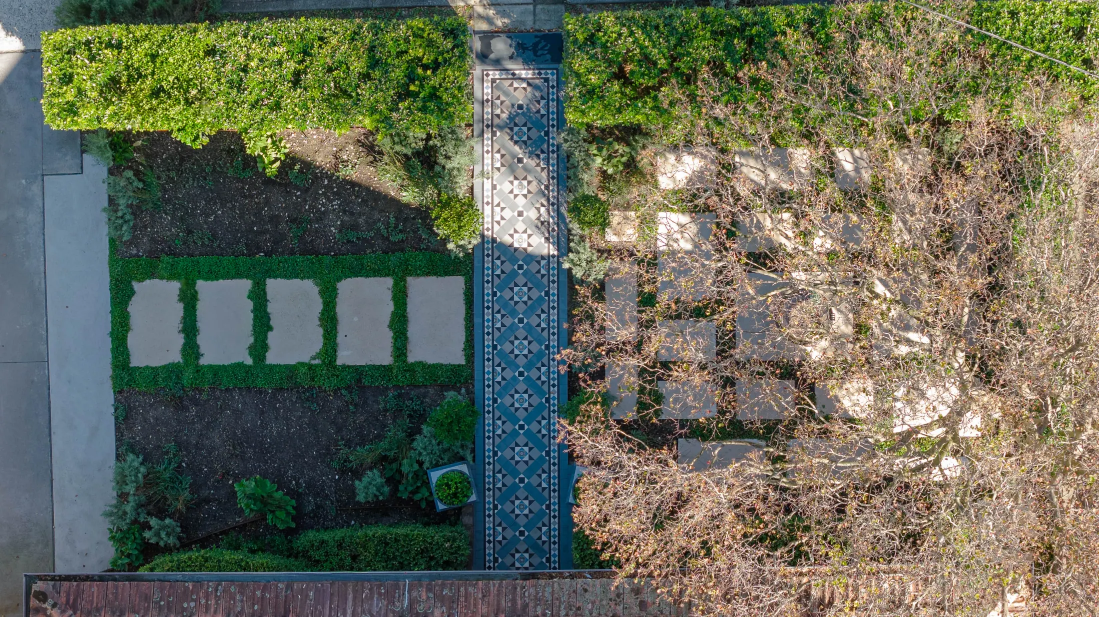 Newly planted terraced garden beds with irrigation